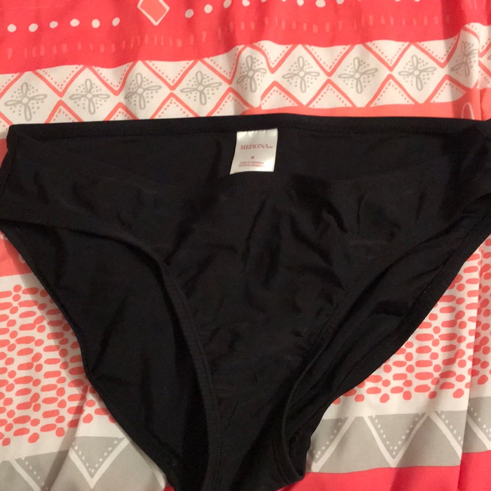 Black target bathing suite bottoms